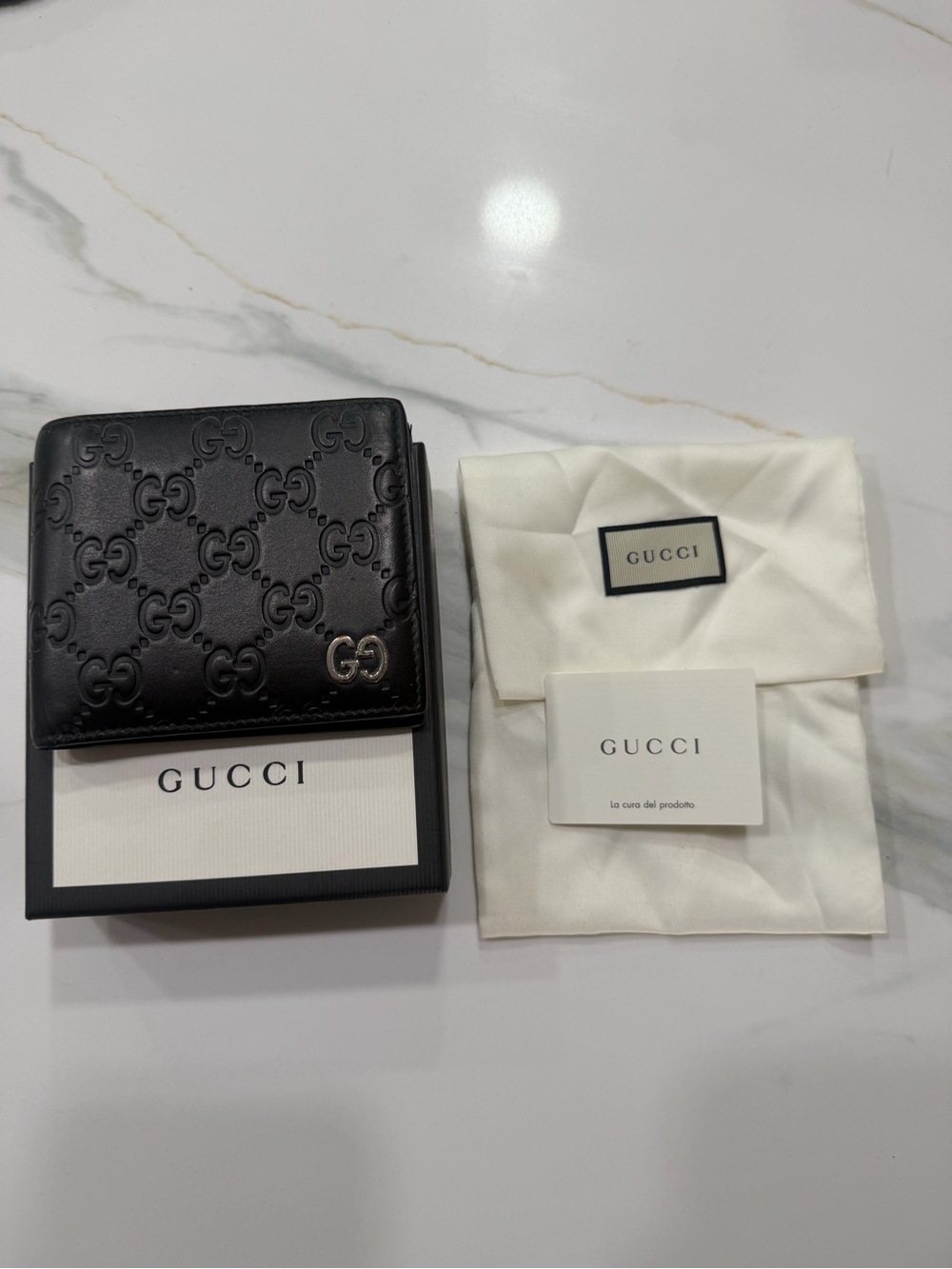 Gucci Black Embossed GG Leather Card Holder with Metal GG